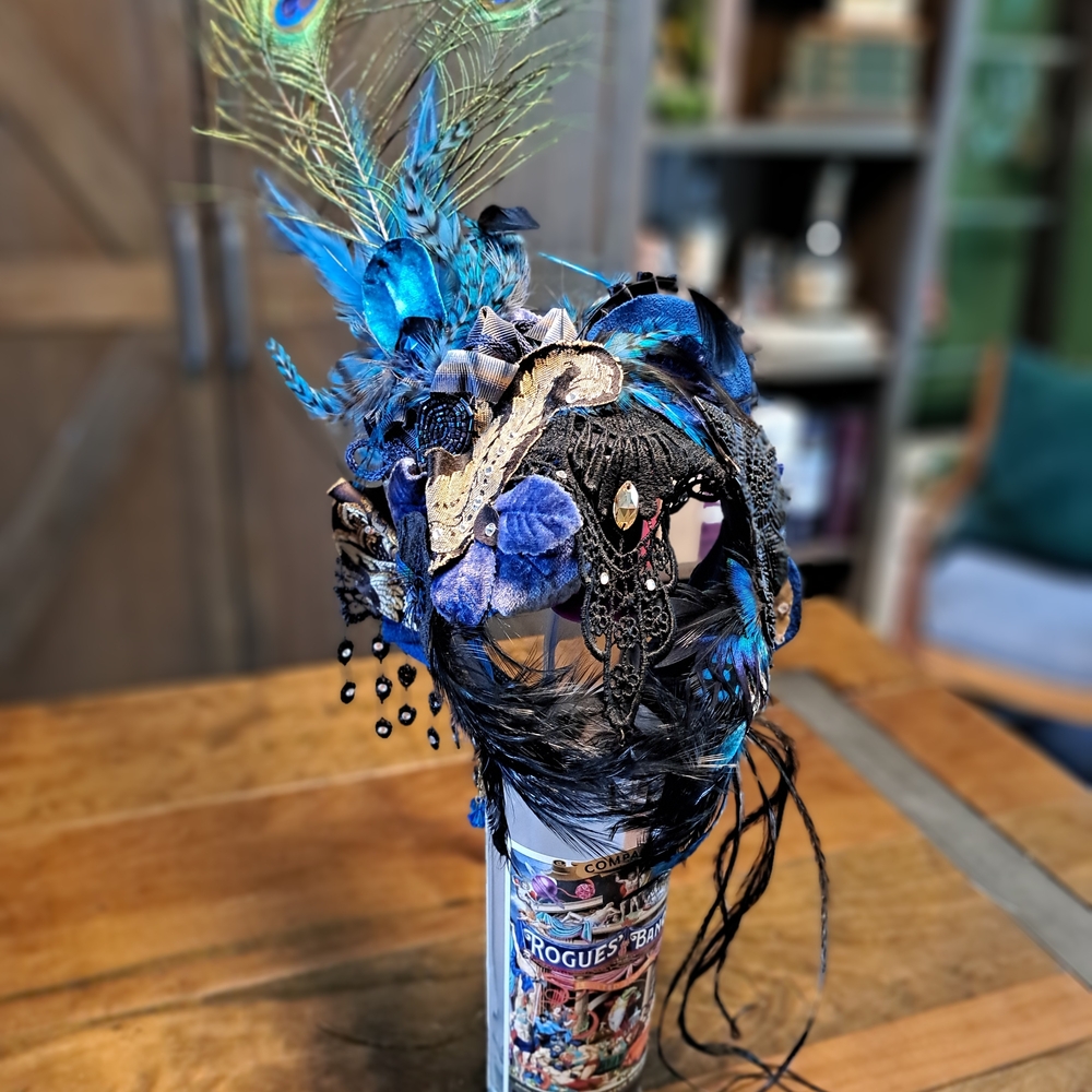 Elegant Blue and Black Feathered Headpiece
